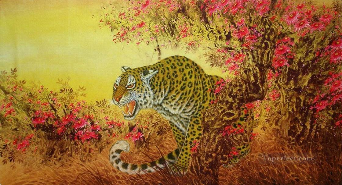 tigre derrière des arbres floraux Peintures à l'huile